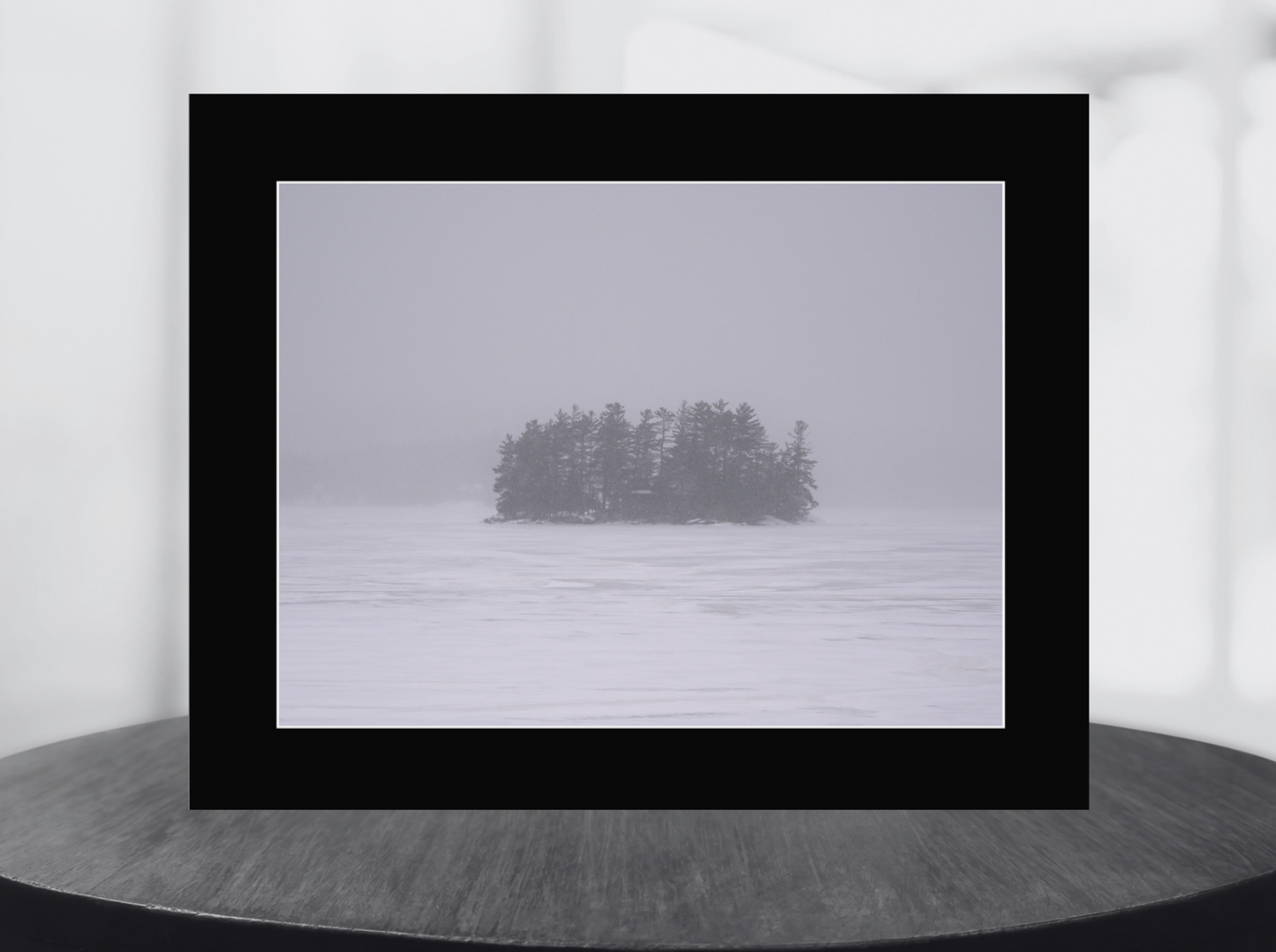 print of an island in the snow