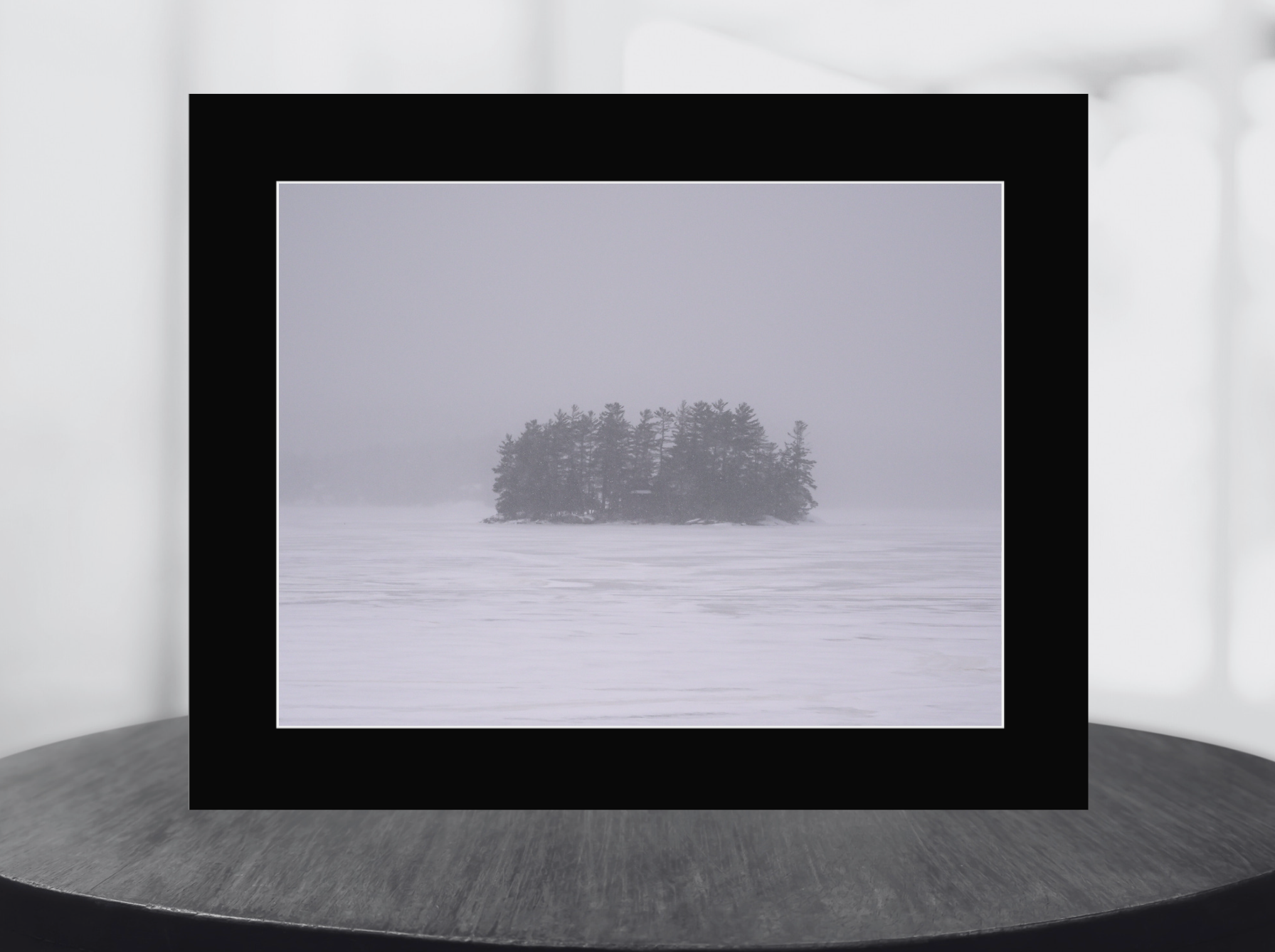 print of an island in the snow