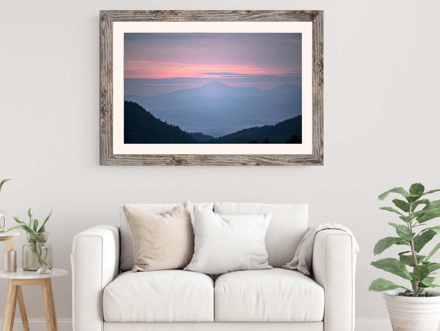 print of a hazy sunrise over the Champlain valley and camels hump mountain from the Adirondack Mountains