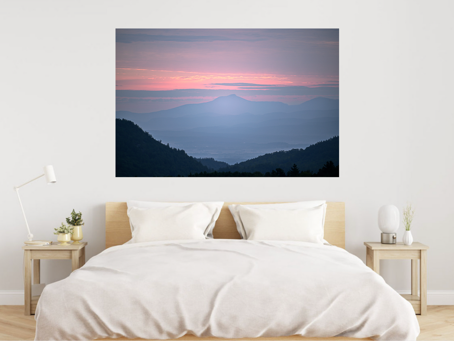 print of a hazy sunrise over the Champlain valley and camels hump mountain from the Adirondack Mountains