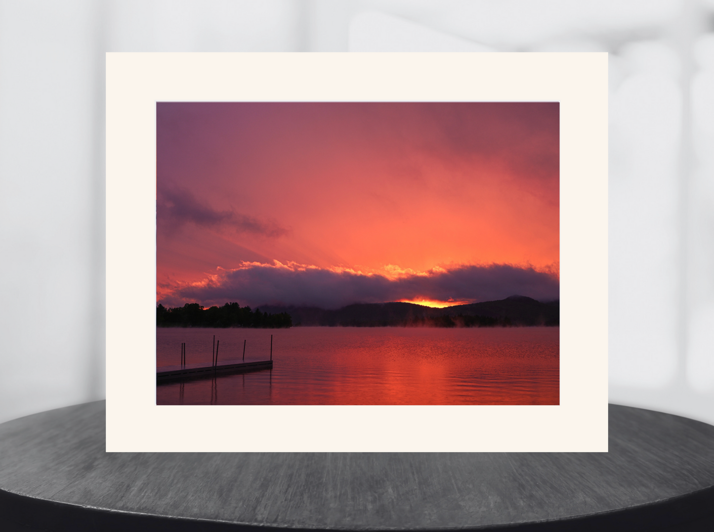 print of a sunset on a lake