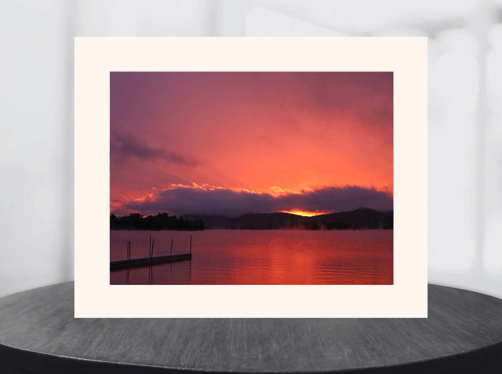 print of a sunset on a lake