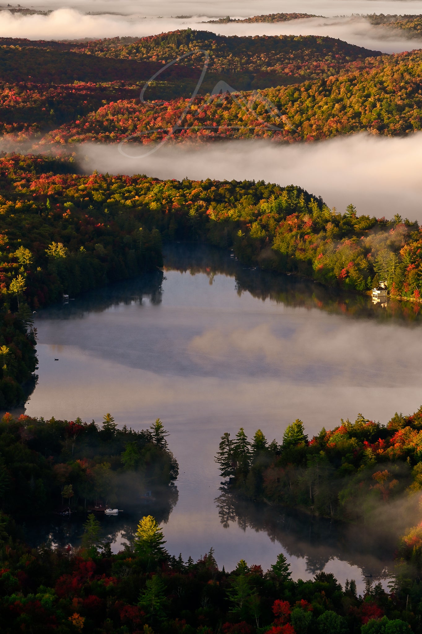 Autumn morning light over the adirondacks from mt arab