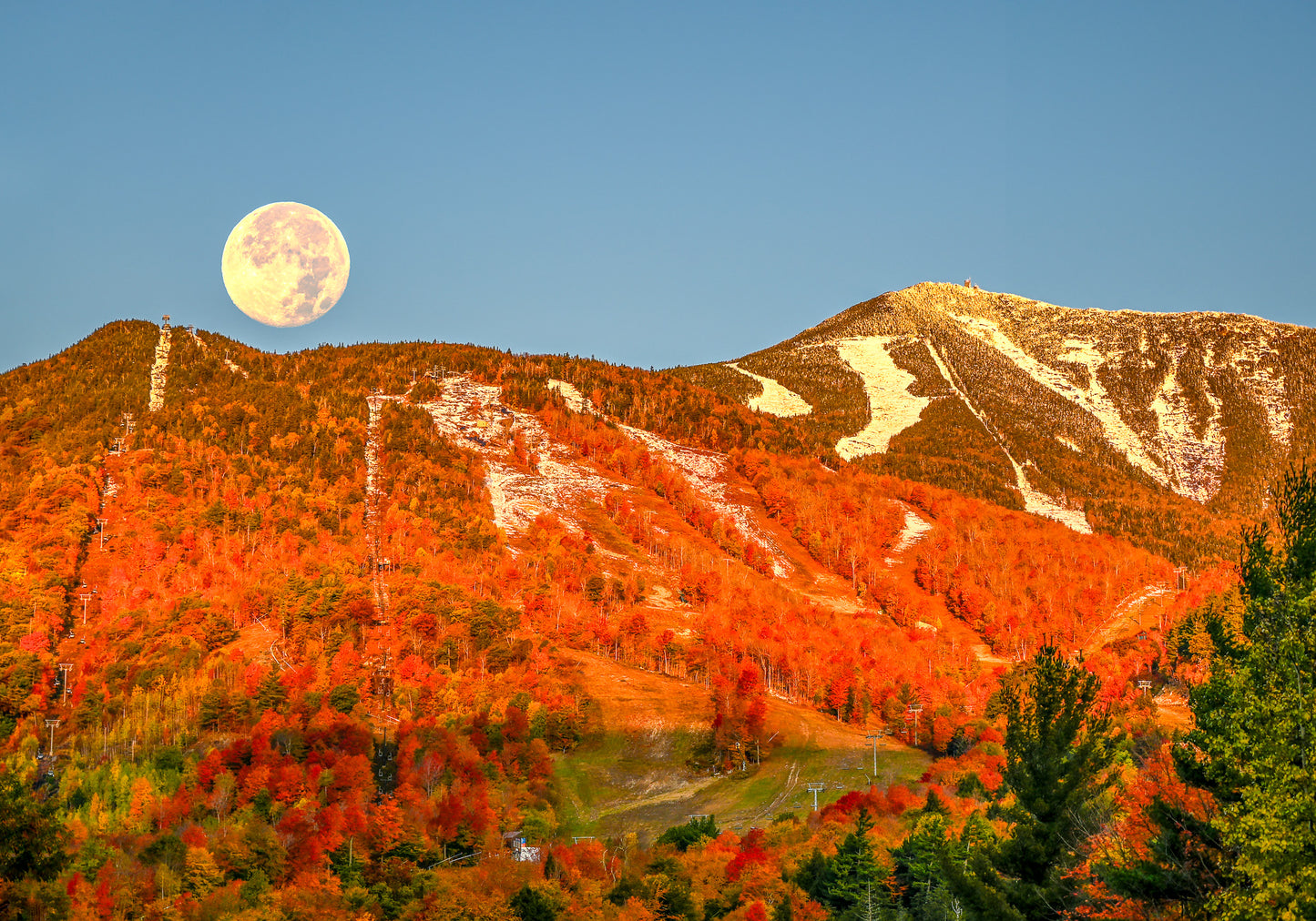 Hunter's Supermoon setting over Whiteface Mountain