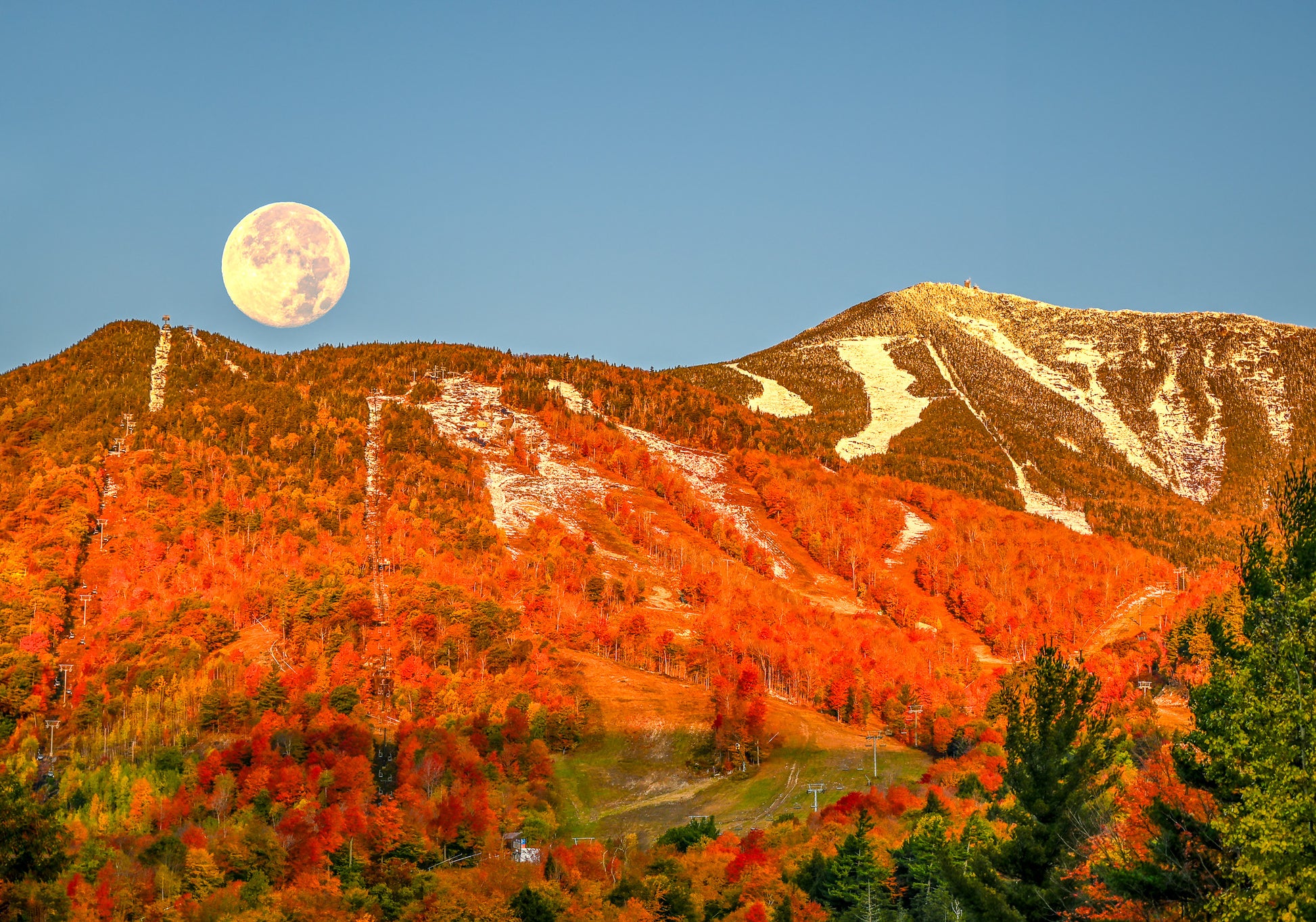 Hunter's Supermoon setting over Whiteface Mountain