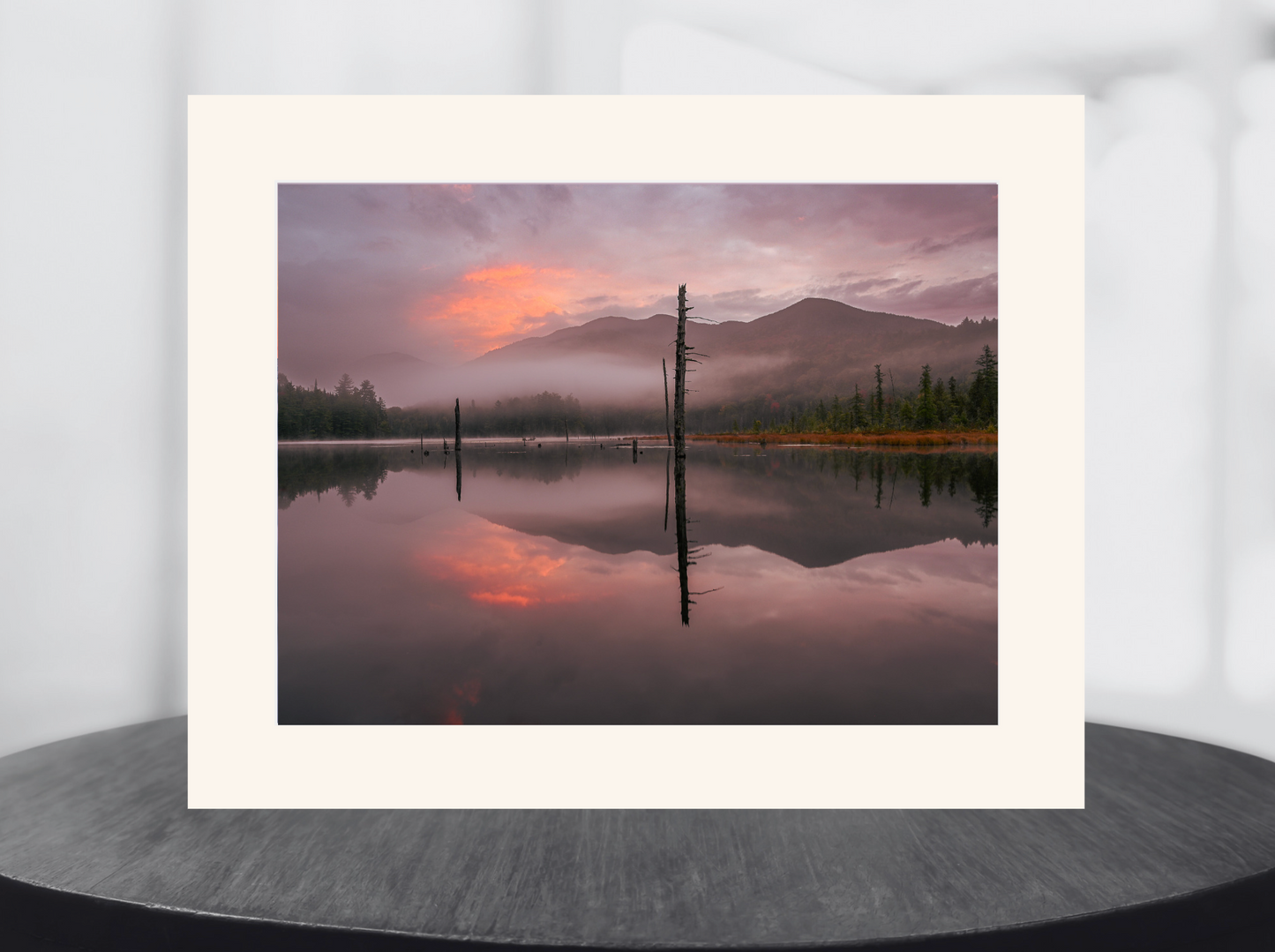 print of a sunrise reflection on a pond