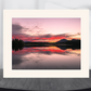 print of sunrise reflections on a pond