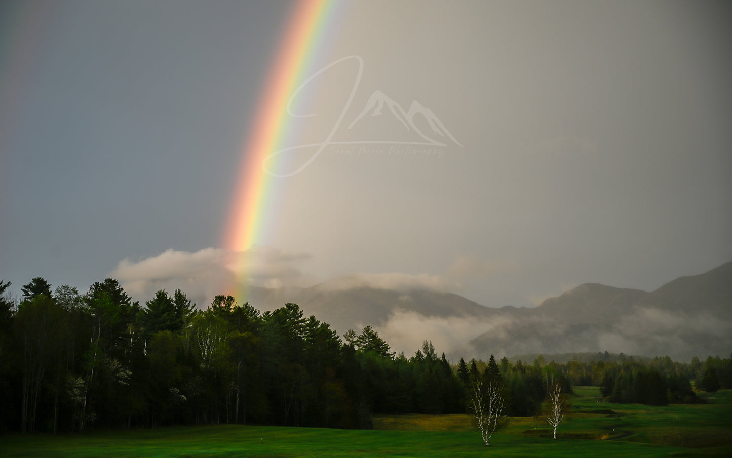 print of a rainbow in the adirondack mountains