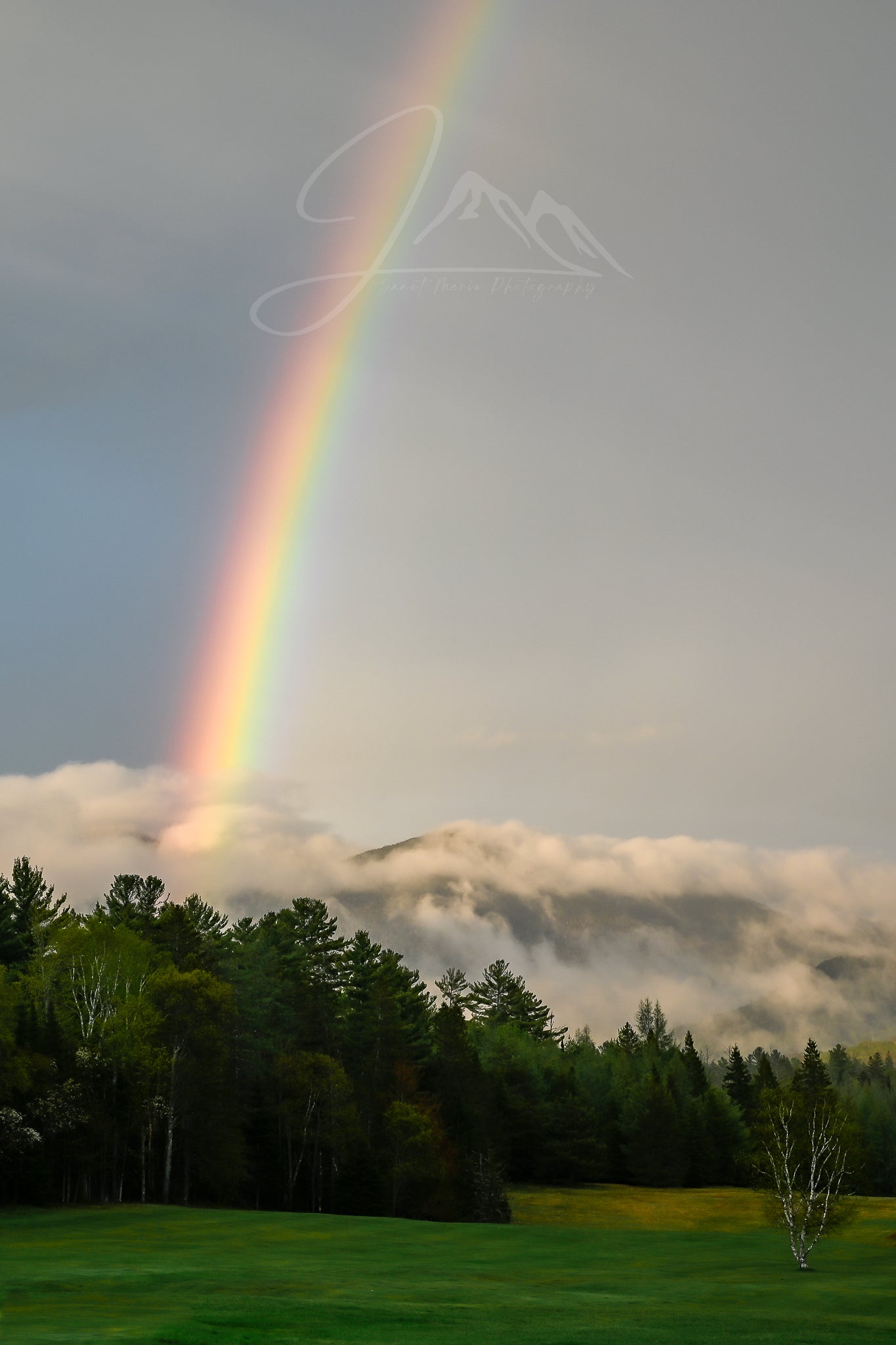 print of a rainbow over the adirondack mountains