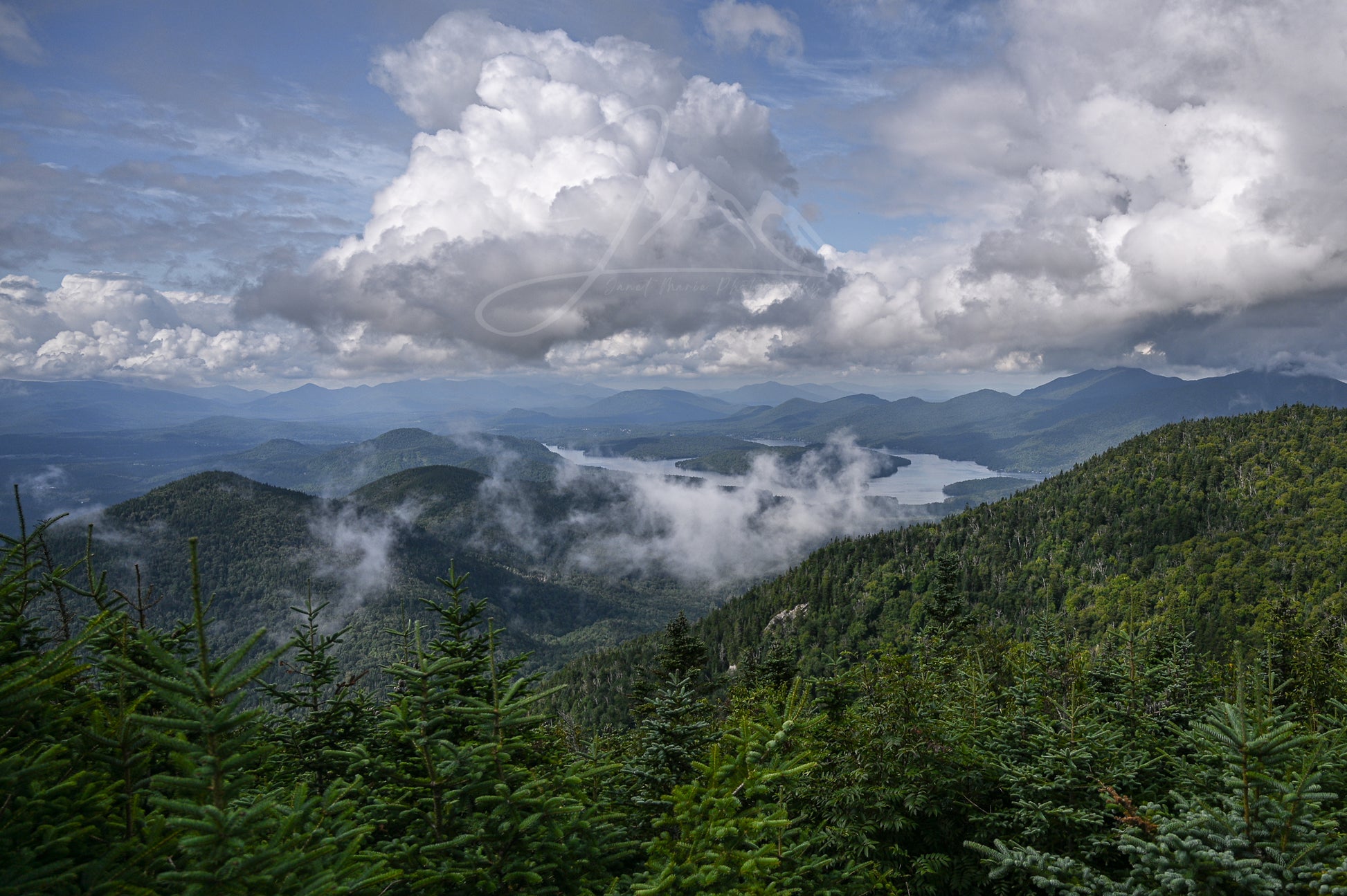 spring rain clouds rolling in over Lake Placid from atop Whiteface Mountain print